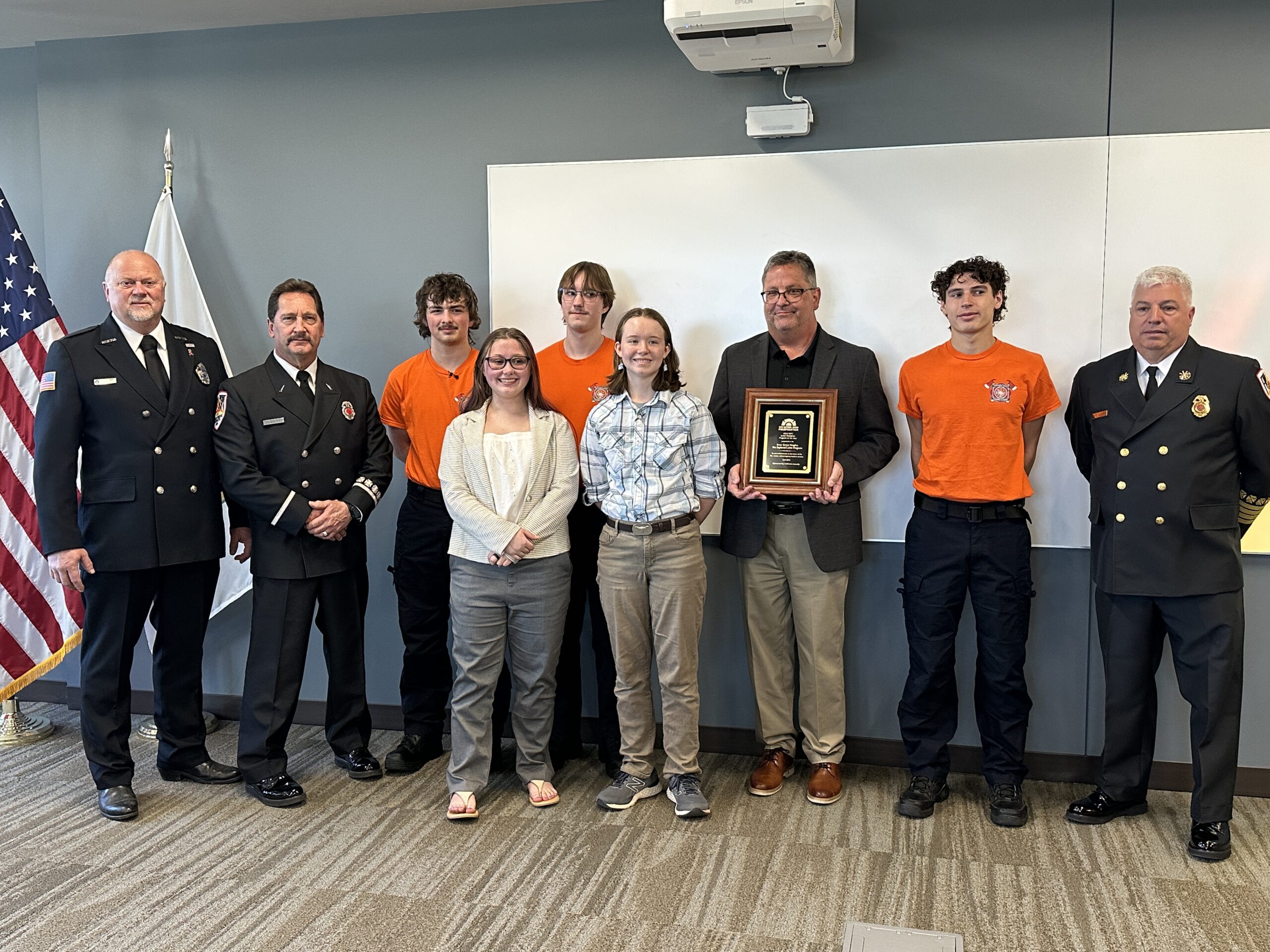 Members of the Inver Grove Heights Explorer Program accept National Junior Firefighter Program of the Year Award